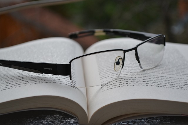 glasses on an open book