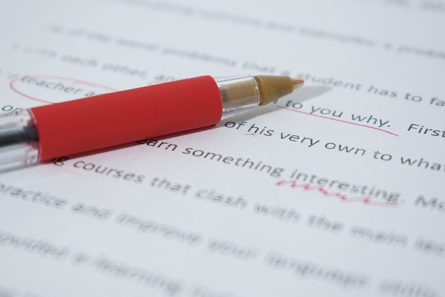 red pen on a marked document