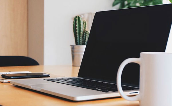 laptop and coffee mug