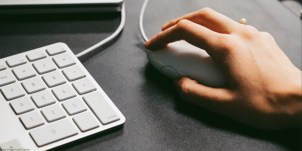 person using a mouse and keyboard