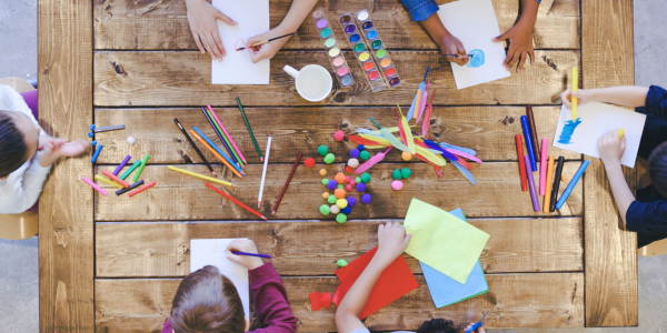 children coloring and doing crafts