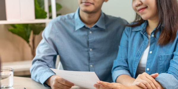 two people holding contract