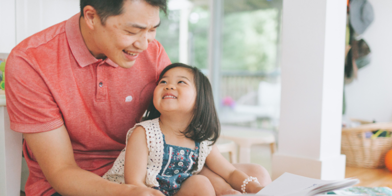 parent reading with toddler