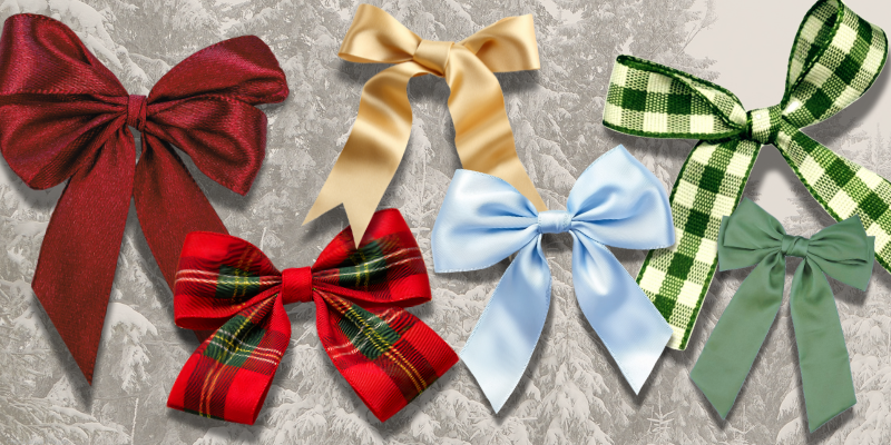 translucent image of snowy trees with a variety of colored holiday bows overlapping