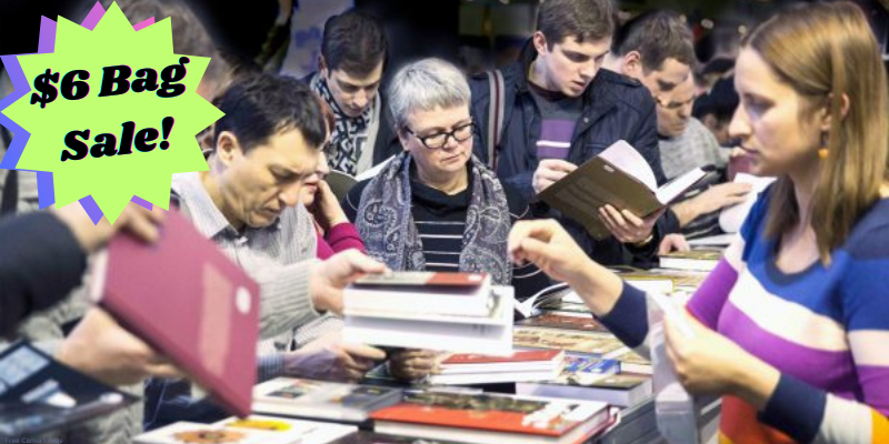 people shopping for books at a book sale with a shape that has text that reads "$6 Bag Sale!"