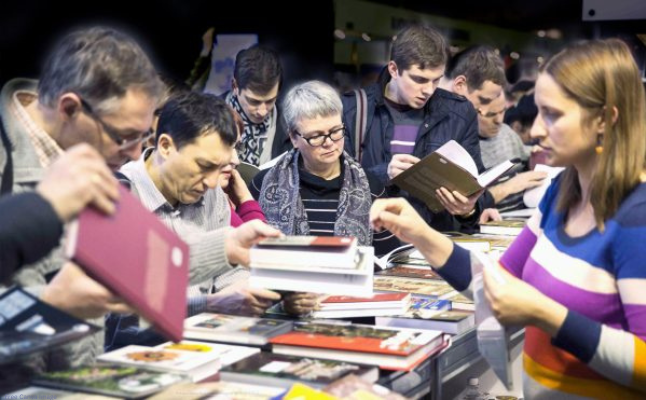 people shopping for books at a book sale