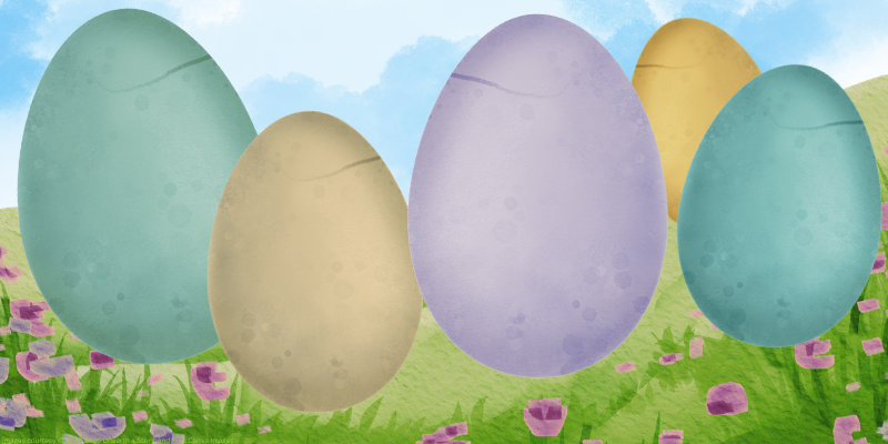 image of grass and colorful dinosaur eggs