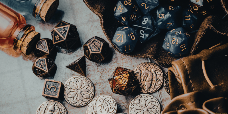 gaming dice, a bag, coins, and bottles