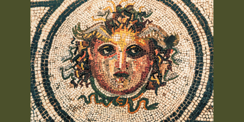 mosaic tiles with the face of a woman and a snake