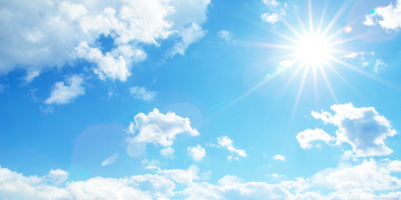 image of the sky with the sunshine and a few clouds