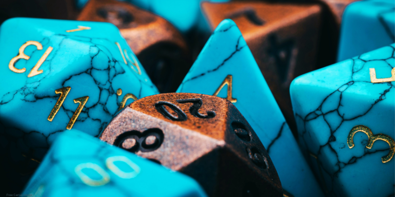 close up image of blue and brown d20 dice